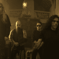 Jeff Hanneman (far left) of Slayer recently passed away. 'Louder Than Hell' catalogues the history of metal.