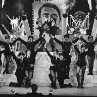 'Springtime For Hitler' from Mel Brooks film and Broadway musical The Producers is likely the funniest song to deal with Hitler.