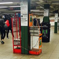 Metro and amNY newspaper racks in Union Square, one of eight subway stations where hawkers have already been replaced.