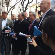State Assemblyman David Weprin (with red tie) spoke near the Manhattan entrance to the Queensboro Bridge in opposition to the Governor's congestion pricing proposal.