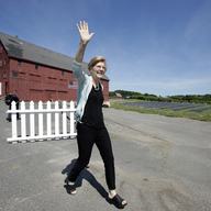 Sen. Elizabeth Warren, D-Mass., waves as she arrives at Belkin Family Lookout Farm before a town hall event, Sunday, July 8, 2018, in Natick, Mass.