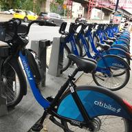 One of Citi Bike's new pedal assist e-bikes at a dock in Williamsburg with other regular bikes. Citi Bike will increase the number of e-bikes to 1,000 by the time the L train shuts down next April.