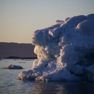 Iceberg floating in the Nuup Kangerlua Fjord in southwestern Greenland, 2017. Greenland's glaciers have been melting and retreating at an accelerated pace in recent years due to warmer temperatures.