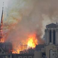 Flames rise from Notre Dame cathedral as it burns in Paris, Monday, April 15, 2019. 