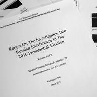 Special counsel Robert Mueller's redacted report on Russian interference in the 2016 presidential election as released on Thursday, April 18, 2019, is photographed in Washington.