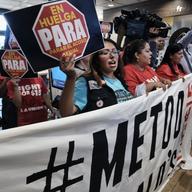 McDonald's workers protest inside of a McDonalds restaurant in south Los Angeles on Tuesday, Sept. 18, 2018.
