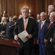 House Minority Leader Kevin McCarthy of Calif., center, is joined by fellow Republican lawmakers as he walks up to the podium to begin speaking during a news conference on Capitol Hill, Oct. 31, 2019.