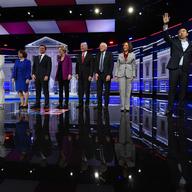 Democratic presidential candidates wave to the audience before a Democratic presidential primary debate, Wednesday, Nov. 20, 2019, in Atlanta.