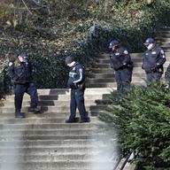 Law enforcement officers search Morningside Park, Thursday, Dec. 12, 2019. An 18-year-old Barnard College freshman, identified as Tessa Majors, was fatally stabbed during an armed robbery in the park.