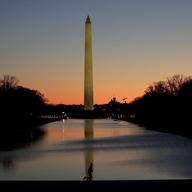 The Washington Monument is seen at a distance before sunrise on Capitol Hill in Washington, Thursday, Dec. 19, 2019, a day after the U.S. House voted to impeach President Donald Trump.