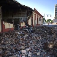 Debris from a collapsed wall of a building litters the ground after an earthquake struck Puerto Rico before dawn, in Ponce, Puerto Rico, Tuesday, Jan. 7, 2020.