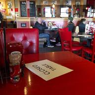 A Red Robin reastaurant in Tigard, Ore., has closed some tables in order to maintain 'social distancing' between diners per CDC guidelines Sunday, March 15, 2020. 
