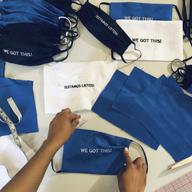 Briana Danyele sews cloth face masks that say 'We Got This!' in her mother's living room in Greer, S.C., which will be sent to health care workers.