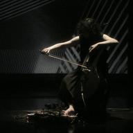 Clarice Jensen with cello and pedal board