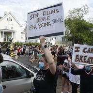 Hundreds of protesters gather Tuesday, May 26, 2020, near the site of the arrest of George Floyd, who died in police custody Monday night in Minneapolis.
