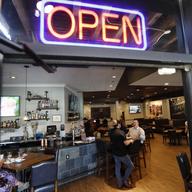 Customers enjoy drinks and meals at CraftWay Kitchen, an indoor and patio dinning restaurant in Plano, Texas, May 1, 2020.