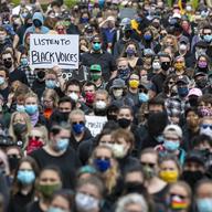Demonstrators gather at a rally to peacefully protest and demand an end to institutional racism and police brutality, Wednesday, June 3, 2020, in Portland, Maine.