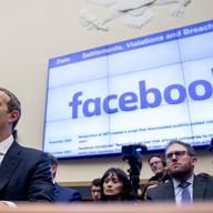 Oct. 23, 2019, file photo shows Facebook CEO Mark Zuckerberg testifying before a House Financial Services Committee hearing on Capitol Hill in Washington.