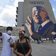 People gather at a make-shift memorial near the home of Rep. John Lewis, D-Ga., Sunday, July 19, 2020, in Atlanta. Lewis, who died Friday at age 80.