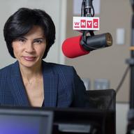 Jami Floyd sitting in front of a WNYC microphone