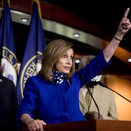 ouse Speaker Nancy Pelosi of Calif., accompanied by Rep. Dan Kildee, D-Mich., left, and Rep. Danny Davis, D-Ill., right, speaks at a news conference on Capitol Hill in Washington, Friday, 7/24/20.