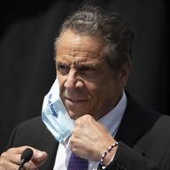 In this June 15, 2020, file photo, New York Gov. Andrew Cuomo removes a mask as he holds a news conference in Tarrytown, N.Y.