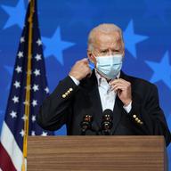 Democratic presidential candidate former Vice President Joe Biden removes his face mask to speak Thursday, Nov. 5, 2020, in Wilmington, Del.