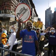 A supporter of Vice President Joe Biden demonstrates outside the Pennsylvania Convention Center where votes are being counted, Friday, Nov. 6, 2020, in Philadelphia.