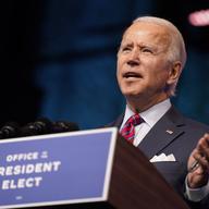 In this Dec. 4, 2020, photo, President-elect Joe Biden speaks about jobs at The Queen theater in Wilmington, Del.