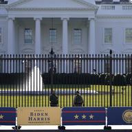 A security team patrols in front of the White House as preparations continue ahead of President-elect Joe Biden's inauguration ceremony, Tuesday, Jan. 19, 2021, in Washington.