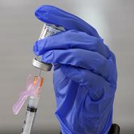 A nurse prepares a COVID-19 vaccine Thursday, Jan. 28, 2021 in Pittsboro, N.C.
