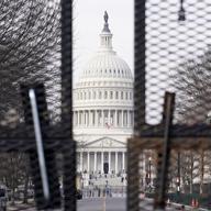 Security surrounds the U.S. Capitol in Washington, Friday, Jan. 15, 2021, ahead of the inauguration of President-elect Joe Biden and Vice President-elect Kamala Harris. 