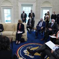 In this Feb. 3, 2021, file photo President Joe Biden and Vice President Kamala Harris meet with Senate Majority Leader Sen. Chuck Schumer of N.Y., left, and other Democratic lawmakers to discuss...