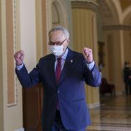 Senate Majority Leader Chuck Schumer, D-N.Y., leaves the chamber just after the Senate narrowly approved a $1.9 trillion COVID-19 relief bill, at the Capitol in Washington, Saturday, March 6, 2021.