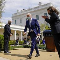 President Joe Biden, accompanied by Vice President Kamala Harris, right, and Attorney General Merrick Garland, left, departs after speaking about gun violence prevention in the Rose Garden.