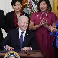 President Joe Biden smiles after signing the COVID-19 Hate Crimes Act, in the East Room of the White House, Thursday, May 20, 2021, in Washington.