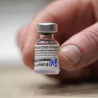 This Jan. 24, 2021, file photo shows a vial of the Pfizer vaccine for COVID-19 in Seattle. U.S. regulators on Monday, May 10, 2021, expanded use of Pfizer's shot to those as young as 12.