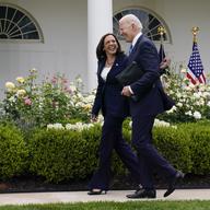 In this May 13, 2021, file photo President Joe Biden walks with Vice President Kamala Harris after speaking on updated guidance on face mask mandates and COVID-19 response, in the Rose Garden of the W
