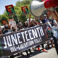 In this June 19, 2020 file photo, protesters chant as they march after a Juneteenth rally at the Brooklyn Museum, Friday, June 19, 2020, in the Brooklyn borough of New York.
