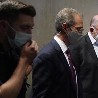 The Trump Organization's Chief Financial Officer Allen Weisselberg, right, leaves a courtroom in New York, Thursday, July 1, 2021.