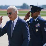 President Joe Biden salutes as he steps off Air Force One, Friday, July 9, 2021, at Delaware Air National Guard Base in New Castle, Del. Biden is spending the weekend at his home in Delaware. 