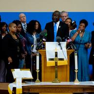 Attorney Benjamin Crump, accompanied by the family of Ruth Whitfield, a victim of shooting at a supermarket, speaks with members of the media during a news conference in Buffalo, N.Y., Monday, May 16,
