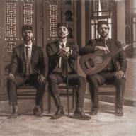 Photograph of three seated men