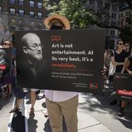 A group of writers and supporters gather in solidarity in support of author Salman Rushdie outside the New York Public Library, Friday, Aug. 19, 2022, in New York.