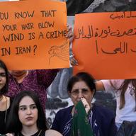 Kurdish women activists hold up placards during a protest against the death of Iranian Mahsa Amini in Iran, at Martyrs' Square in downtown Beirut, Lebanon, Wednesday, Sept. 21, 2022. 