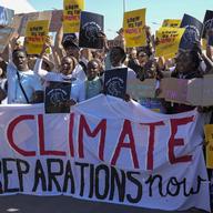 Demonstrators participate in a Fridays for Future protest calling for money for climate action at the COP27 U.N. Climate Summit, Friday, Nov. 11, 2022, in Sharm el-Sheikh, Egypt.