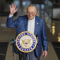 Senate Majority Leader Chuck Schumer, D-N.Y., arrives to attend a press conference in New York, Sunday, Nov. 13, 2022.