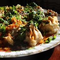 Afghan dumplings filled with meat and onions
