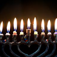 Menorah candles burning