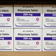 The flat sides of six boxes of mifepristone are stacker two by three, with 'Mifepristone 200mg' in big letters